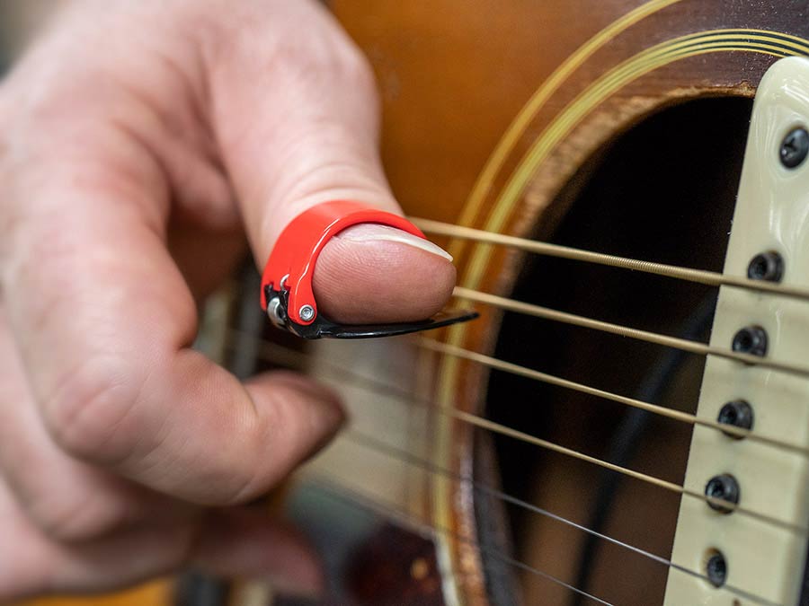 spring action thumb pick LIGHT - extra tight sprin